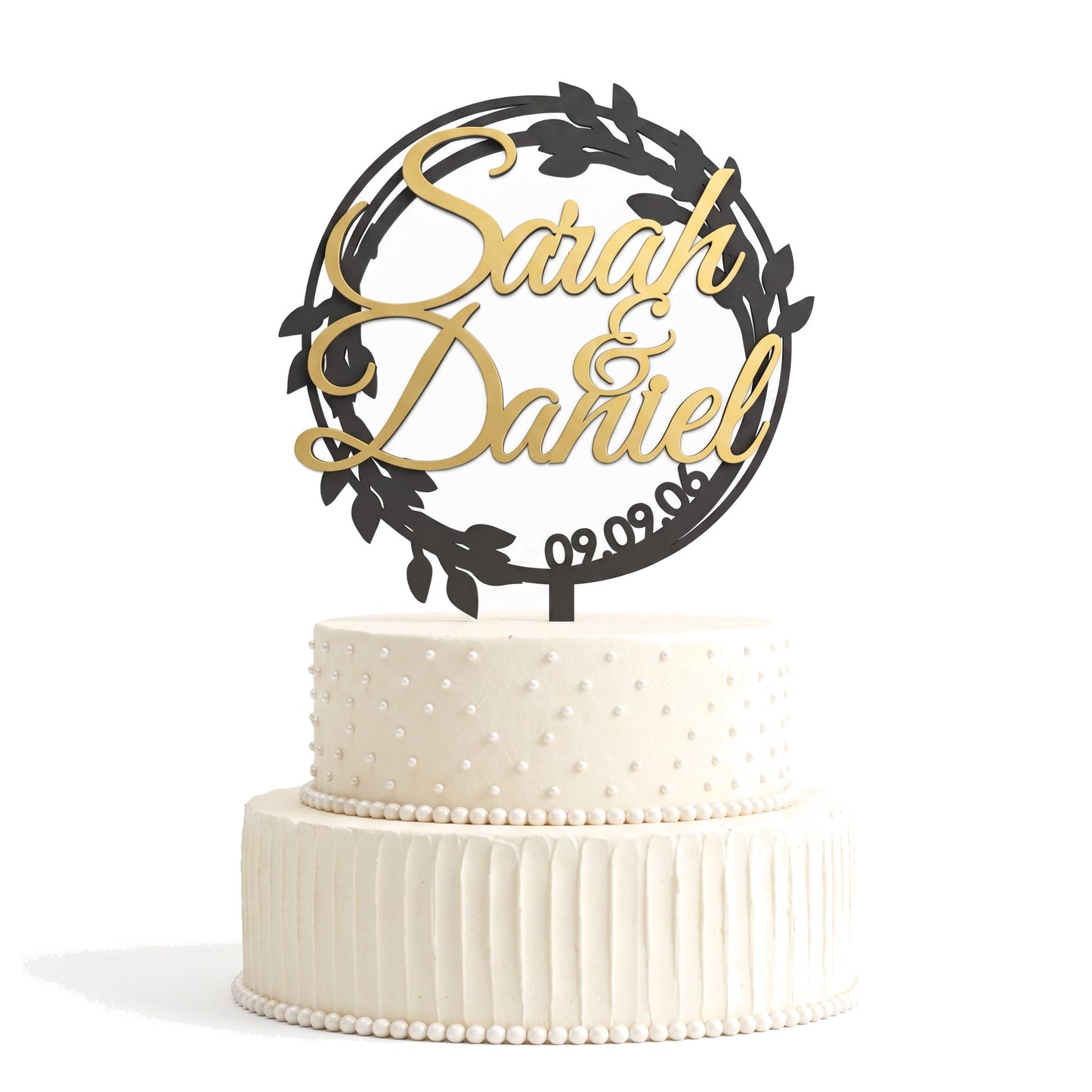 Blätterkranz Cake Topper Schwarz mit goldenen Namen auf der Hochzeitstorte