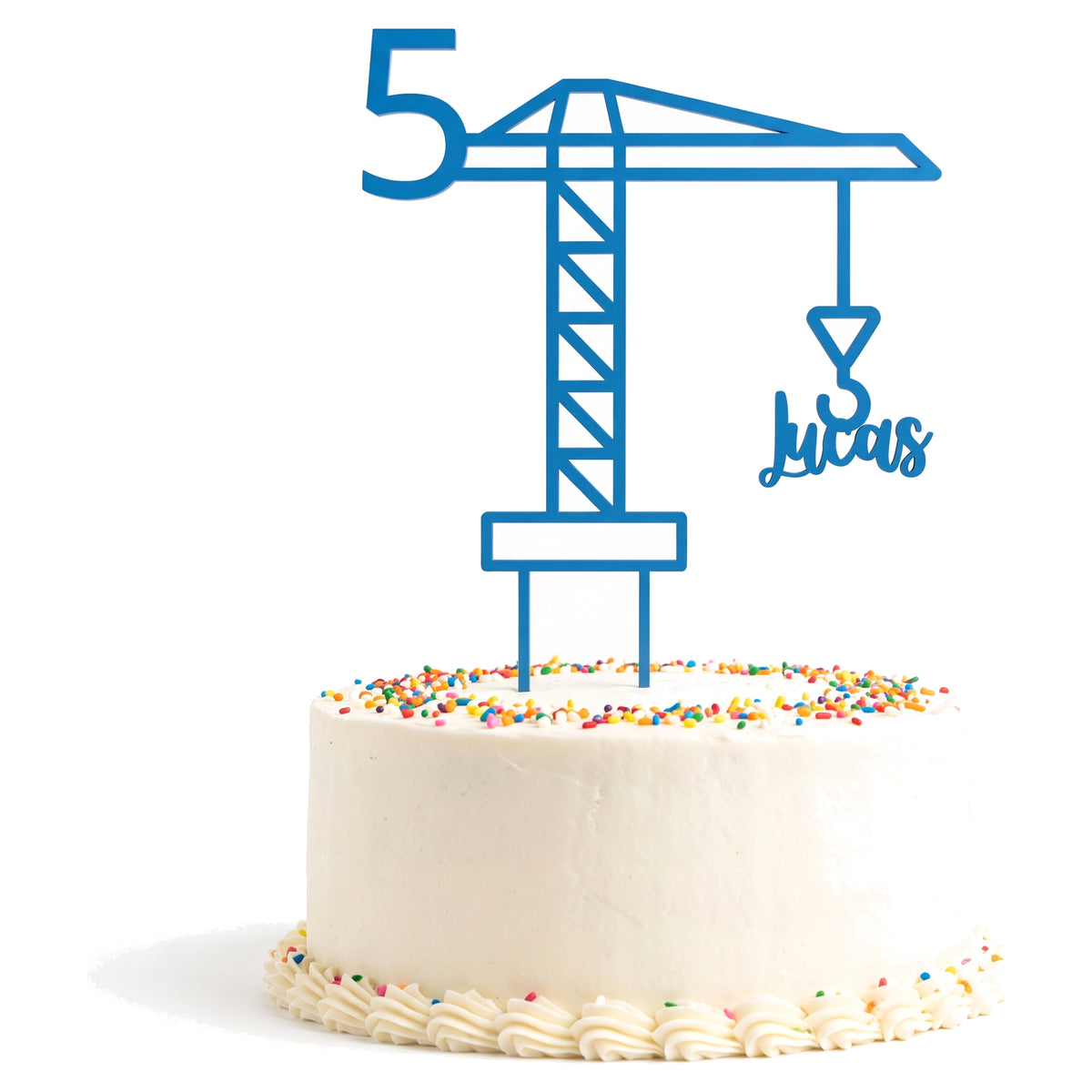 Kran Cake Topper auf Torte, weißer Hintergrund