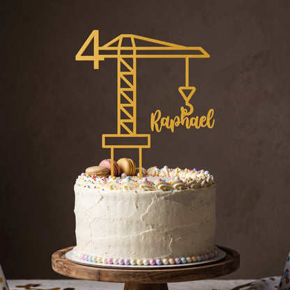 Cake Topper Kran in Gold auf festlicher Torte