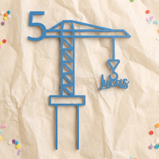 Geburtstag Cake Topper Zahl mit Kran in Blau auf cremefarbenem Krepppapier