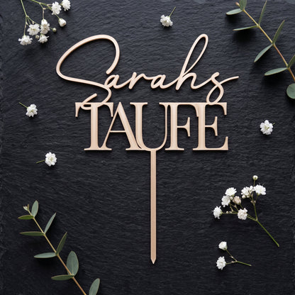 Cake Topper Taufe in Champagner liegend auf dunklem Schiefer
